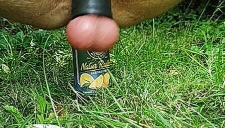 Fucking ass with a bottle outdoors and cum with tied balls