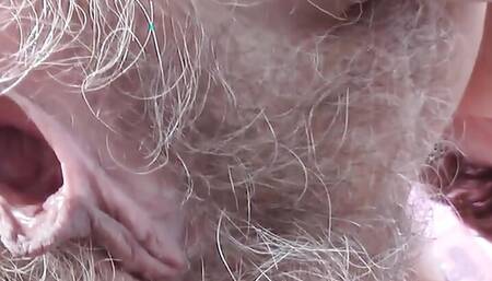 Horny granny fingering and rubbing her hairy pussy Part 1