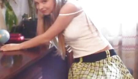 Young jess masturbates in a short mini skirt
