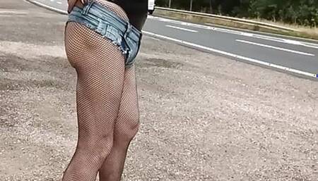 walk in town and roadside solicitation of a sissy in a whore's outfit, vinyl top and mini denim shorts