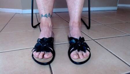 Toe Wiggling In Black Flowery Sandals