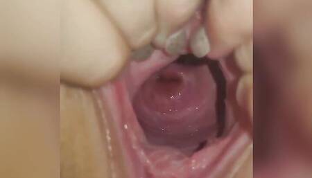 Wide open pussy and cervix show