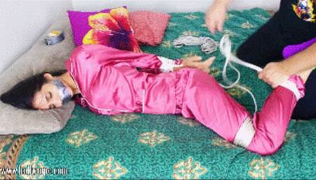 Elsa del Rey is grabbed by a robber while she is bed, then tied and gagged before she can't do anything!