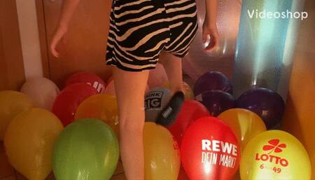 balloon mass pop with 2 girls