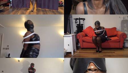 Miss naiirobii, leather bound and gagged submissive