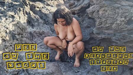 Outdoor: Pee on the rocks on the beautiful italian sea