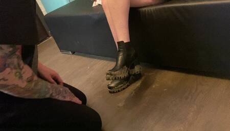 Licking very dirty ankle boots, spit and cigarette ashes