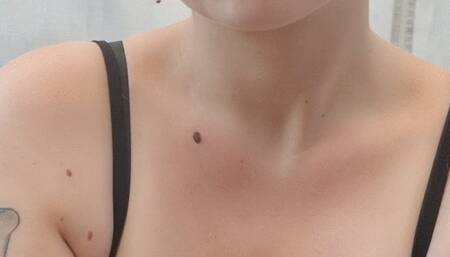 Smoking outside in a black top