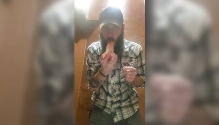 Male deep thoarting a dildo