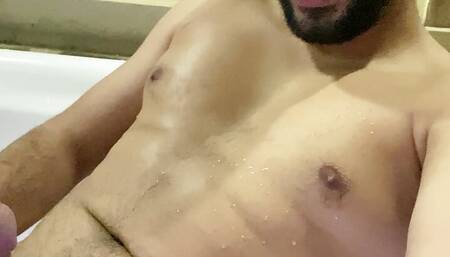 Rodrik in the hot tub with his body all wet playing until he squirt a lot of cum, cumshot in the jacuzzi