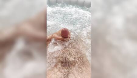 Young amateur playing with his dick in the jacuzzi