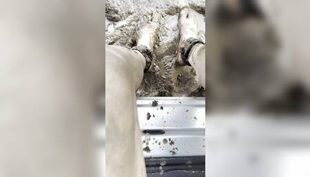 gay slave gettings his legs in the mud