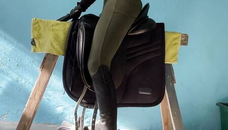 Riding on the dressage saddle + up to close masturbation in leather riding boots