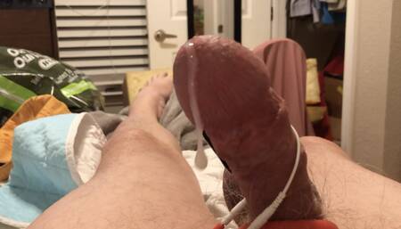 A stiff dick gets a whipping and gives up a hands free orgasm