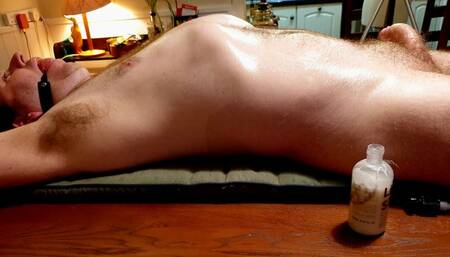 Handjob on a naked man tied to table-BBW domination,BBW bondage,man in bondage,male bondage,amateur,naked man tied up,man tied to table,bound and gagged man,handjob,cock ring,