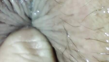 look at the close up of my ass eager to be penetrated while I have my 4 balls skewered deep inside my hairy pussy
