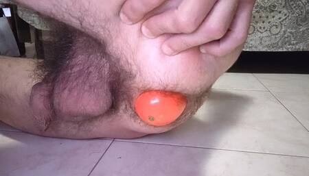 Ass stretching by expelling a big mango and gape