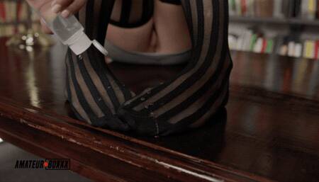 Librarian Studys her Own Feet