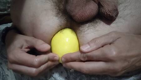 Ass stretching and gape with an insertion of a big lemon in my ass