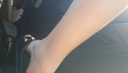 Driving in black sandals through the streets of Milan 720HD