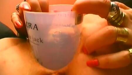 Granny inserts a whole head of lettuce into her pussy