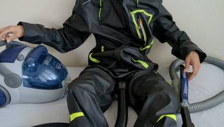 Vacuuming fun in my leather rainwear set