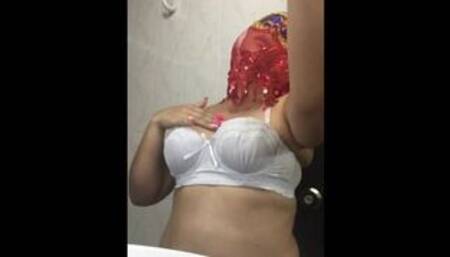 my neighbor records herself touching in the bathroom