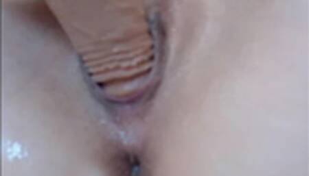 Busty teen amateur fingers her shaved cunt in closeup and squirt