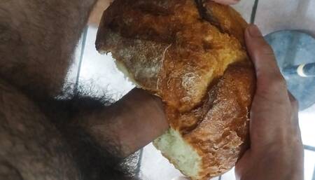 Cumming inside loaf of bread