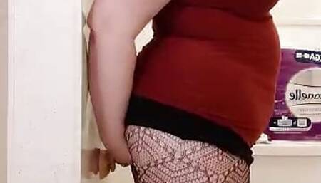 Thick Milf wearing Fishnets in Bathroom with Dildo Stuck to Wall in ASS