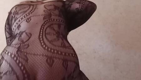 Kitty in mesh suit jumps on dildo
