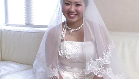 Japanese girl in a wedding dress Emi Koizumi takes a hard cock in her mouth uncensored.