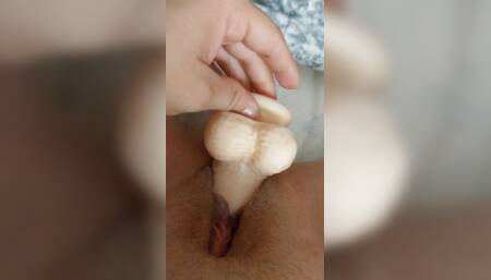 Masturbating