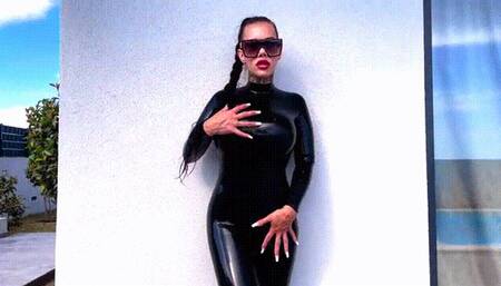 Pee with latex catsuit