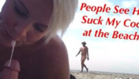 She Gives an Amazing Blow Job on a Public Nude Beach as People Walk By