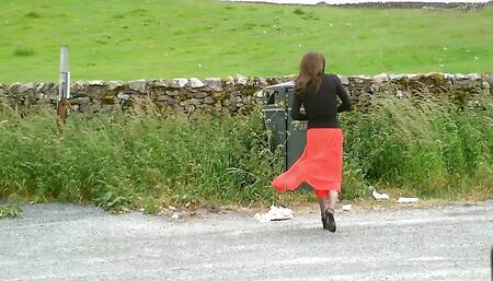Cath in her button fastening skirts