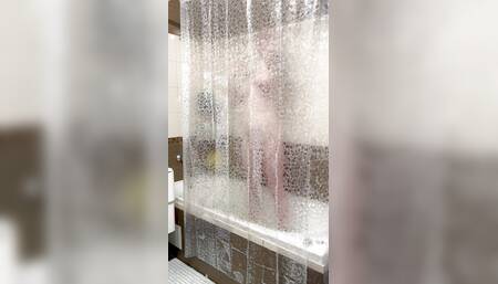 Taking a shower Eva Borisova filmed on a camera out of the corner