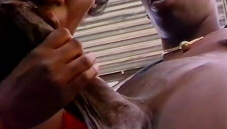 Black MILF eats dick before getting fucked from behind