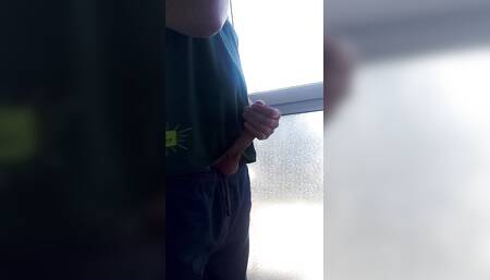 Touching cock on my balcony