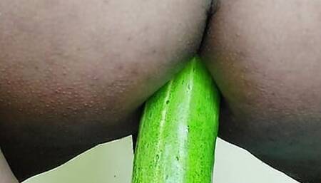 Sissy playing with cucumber and getting her ass ready for big cock