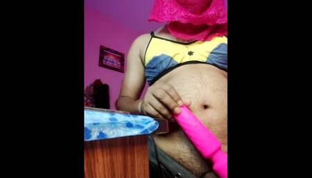 Desi hot boy has become a crossdresser so she wears a bra and gets fucked with a vibrator.
