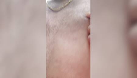 Horny man pinching his nipples with clips