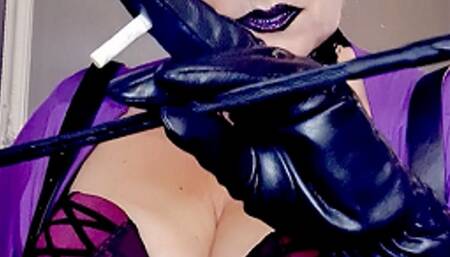 Mistress Queen Joan smokes in leather gloves POV 2 Lucky Strike in a row and teaches you obedience with her crop