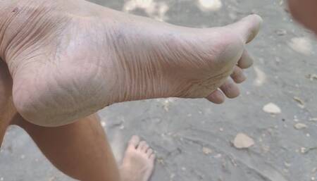 Dirty feet and flaccid dick, naked in public