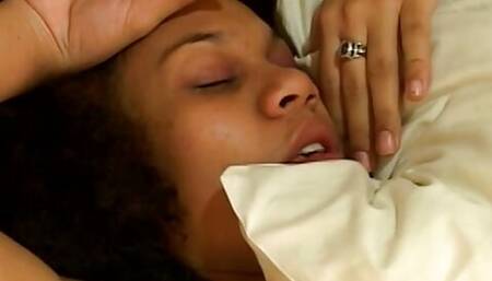 Horny pregnant ebony loves to take it while lying on the bed