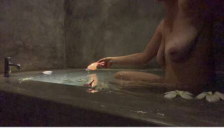 Naked girl bath taking big tits hid camera in the hotel in Indonesia with candles
