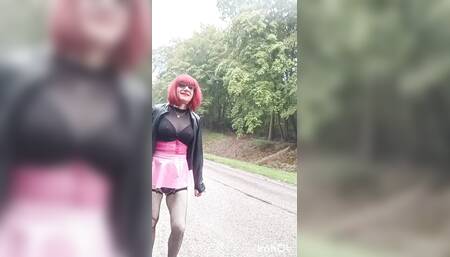 Sissy plays the whore under the rain