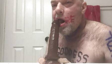Exposed faggot Christopher Allen Foster deepthroats black rubber dong