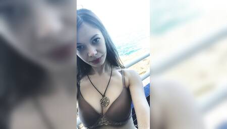 Melody plays with a realistic dildo