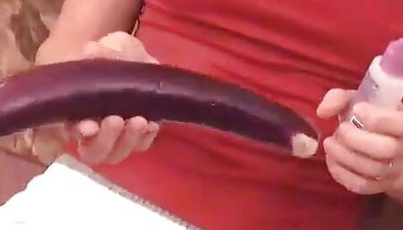 Horny babe masturbates and uses vegetables in her cooch on the floor